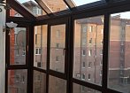 панорамное остекление балкона. Ламинированные пластиковые окна Rehau и фасадный профиль. Статический усилитель от ветровых нагрузок. https://spektr-33 mobile